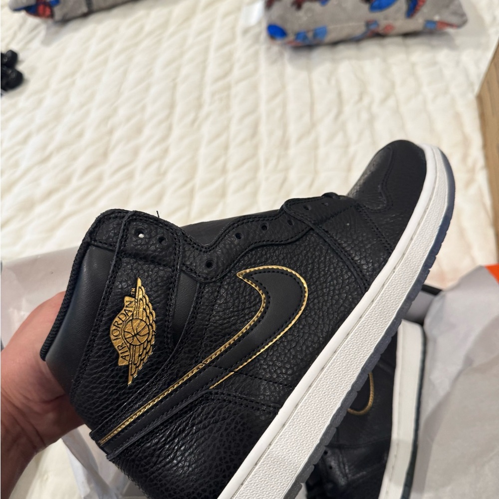 Nike Air Jordan  Black and Gold High-Top Sneakers